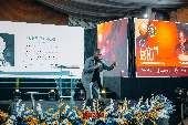 Speaker on stage at Beyond BIU
