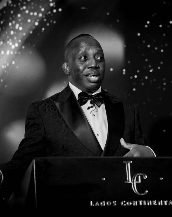 Niyi Adesanya speaking at The Associates inaugural dinner